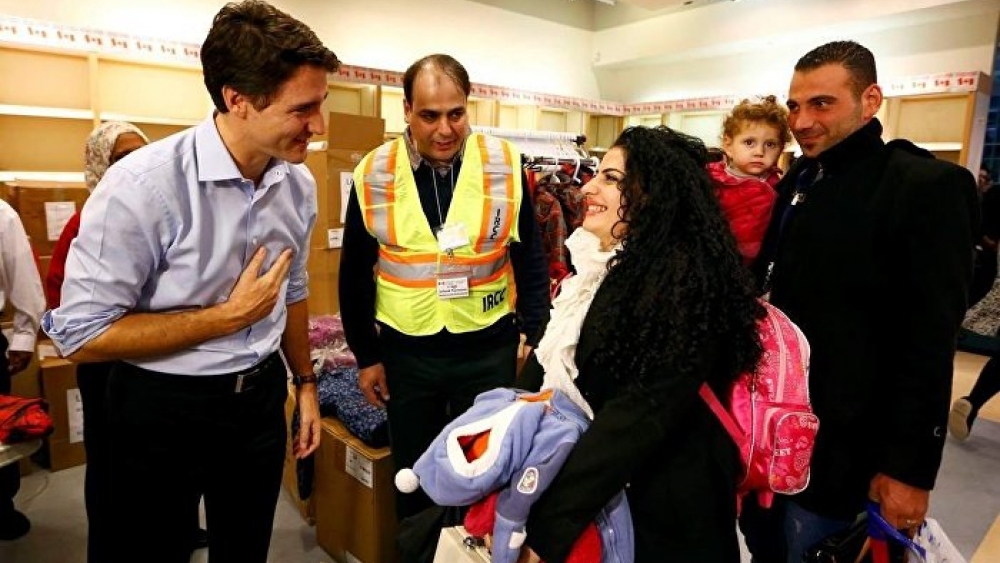 Suriyeli sığınmacıları taşıyan ilk uçak Kanada'da